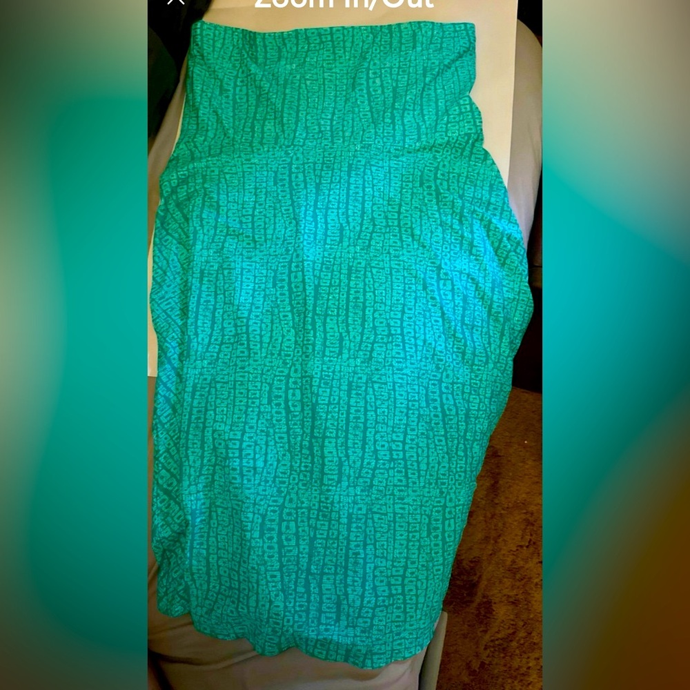 Southwind apparel dress-active leisure ware, UV50. Sleek green strapless dress